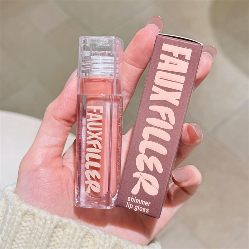 Nouveau Gloss à Lèvres Rare Mu - Huda Beauty Makeup Bag avis et prix